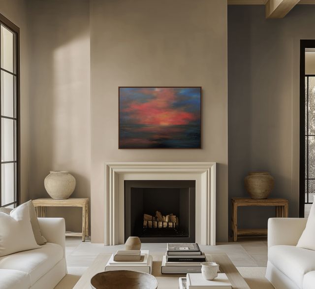 What The Sea Keeps hanging above a fireplace in a living room